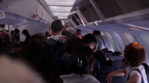 People Exit Airplane (2) Stock Footage 89492750