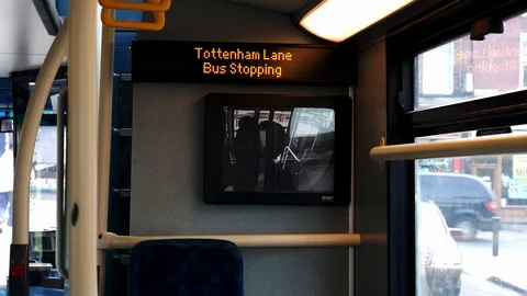 People exiting seen through the screen of a modern bus camera Stock Footage 108566527