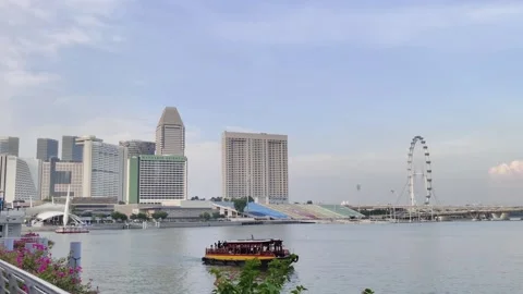 People exploring in front of the Marina Bay Sands Singapore. Stock Footage 249946531
