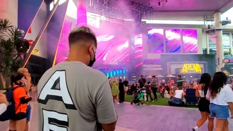 People with Face Masks Walking Inside San Juan T Mobile Convention District Stock Footage 237823033