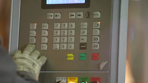People at the Factory Presses a Button on the Remote Stock Footage 50450866