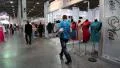 People at fashion show and trade fair HD Footage