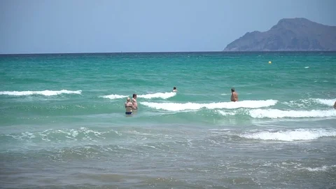 People feeling the waves Stock Footage 128350158