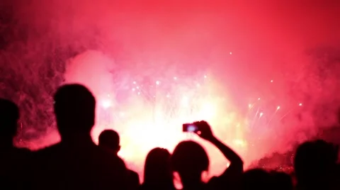 People Filming and taking pictures of Fireworks Display WITH AUDIO Stock Footage