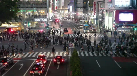 People finish to cross Shibuya pedestrian scramble in Tokyo city, Japan Stock Footage