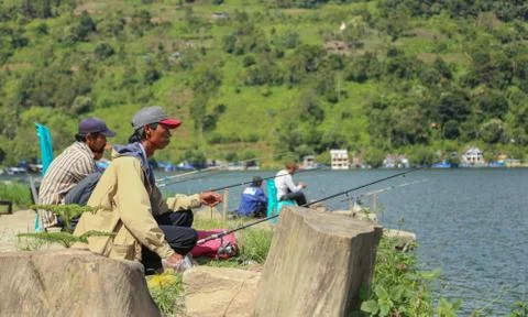 People fishing at Lake Toba Stock Photos