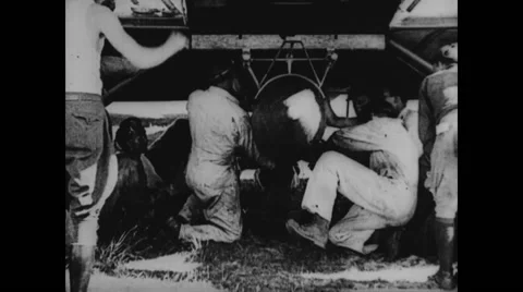 People fitting and checking engine of military aeroplane Stock Footage 43317650