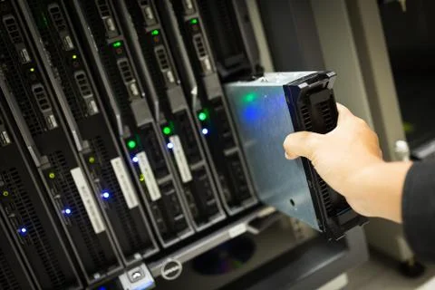 People fix node fiber optic in network room Stock Photos