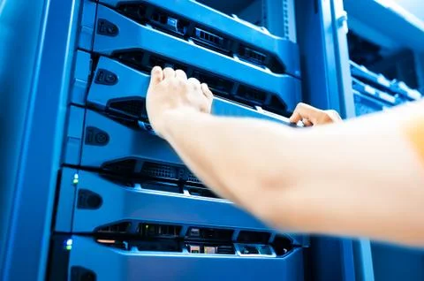 People fix server network in data room Stock Photos