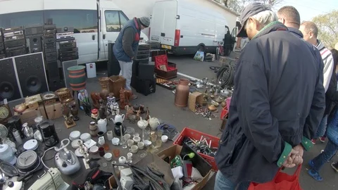 People at The Flea Market Looking at Second Hand Items Stock Footage 99313215
