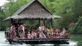 People float on the raft on the Kwai River near Bangkok in Thailand HD Footage