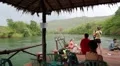 People float on the raft on the Kwai river in northwestern Thailand HD Footage