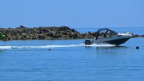 People float on a rubber dragon Stock Footage 109181100