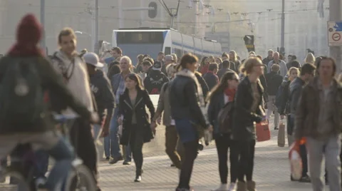 People in front of Amsterdam Centraal train station - graded Stockbeeldmateriaal 58672003