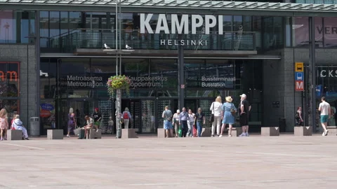 People in front of Kamppi shopping centre in Helsinki, Finland Stock Footage 340604207