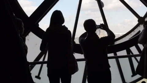 People in front of large clock, PARIS, FRANCE 2/21/2015 Stock Footage 168540652