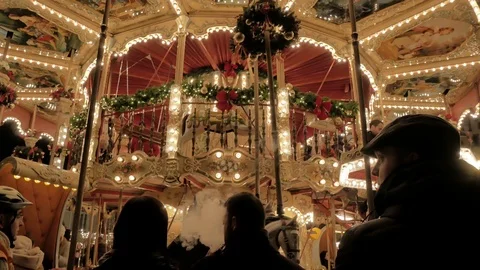 People in front of a nostalgic carousel Stock Footage 70811874