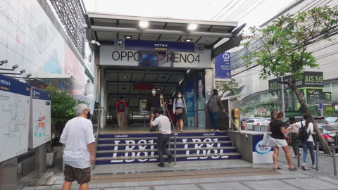 People in front of Phra Ram 9 MRT Subway Station in Bangkok Stock Footage 149123623