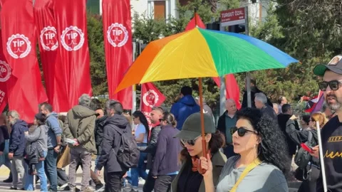 People gathering during a rally to protest against the arrest of Istanbul Mayor  Stock Footage 305677524