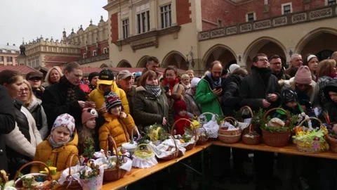 People gathering with Easter food   baskets to be blessed Stock Footage 237812653