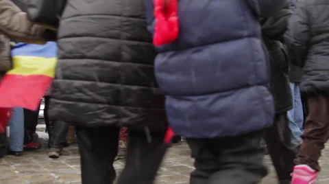People Gathering For An Event, Crowd, Winter Time, Snowing, Cold, Pan Stock Footage 54989388