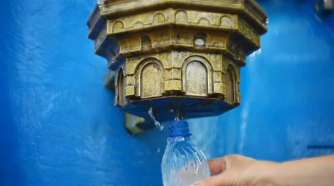 People gathering water from the source Stock Footage 8600169