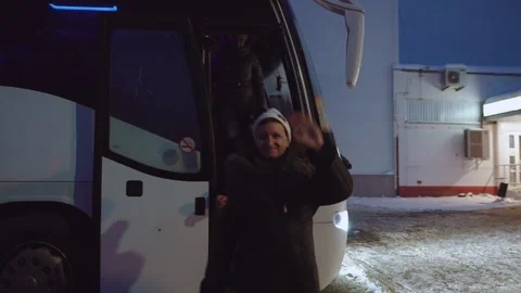 People get off the bus, the bus drops people off Stock Footage 327621280