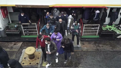 People Get Off From Ferry Stock Footage 142893860