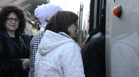 People get on the tram Stock Footage 50376957