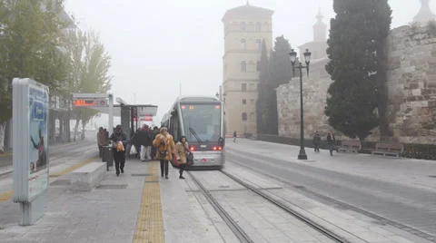 People getting in and out a tram Stock Footage 34863851