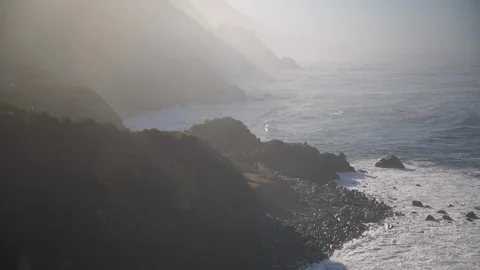 People Getting up from Bluffs and walking towards the shore Uncolored Stock Footage 102416940