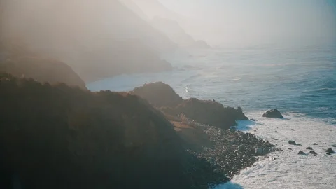 People Getting up from Bluffs and walking towards the shore 库存影片 102416990