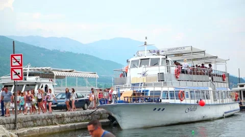 People getting off the boat from daily tour of Ohrid lake. Stock Footage 59779440