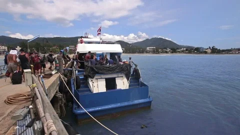 People getting on a boat Stock Footage