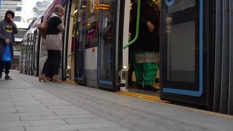 People getting inside tram in new street birmingham Stock Footage 81604587