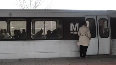 People getting on metro Video stock 60822154