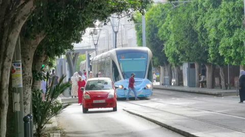 People getting off Rabat tramway in a station Stock Footage 158638544