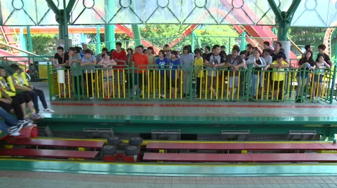 People getting off the roller coaster of Janfusun Fancyworld, Taiwan Stock Footage 60749687