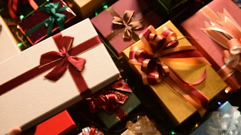 People giving presents to one another in Christmas and New year Festivals Видео 139252300