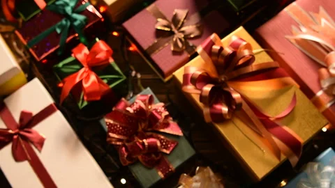 People giving presents to one another in Christmas and New year Festivals Видео 139252320