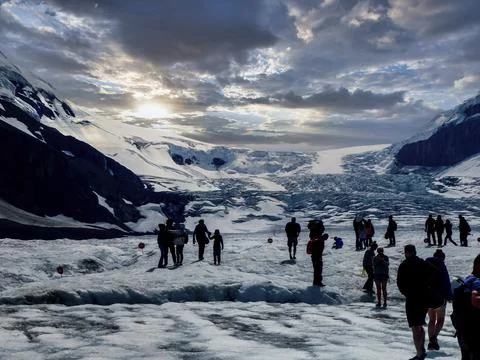 People on the glacier tounge in the mountains Stock Photos