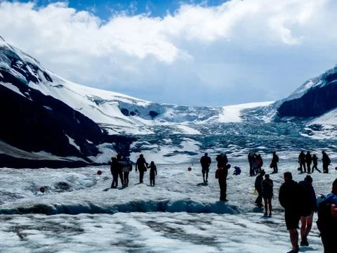 People on the glacier tounge Stock Photos