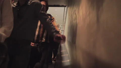 People go down on the escalator in the mall. Stock Footage 136663344