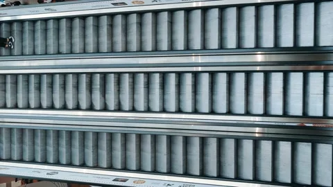 People go Down the Escalator in the Mall Holding the Railing. Shopper's Moving Stock Footage 165979540
