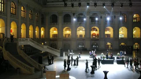 People go on hall and communicate after festive event Stock Footage