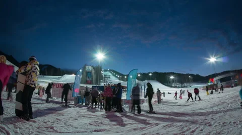 People go to queue on ropeway in ski resort Stock Footage 45391823