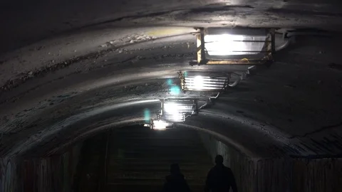 People go through the underpass Stock Footage 124760486