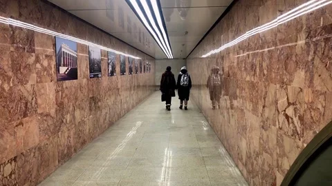 People go through an underpass in the winter. Russia Moscow 17.02.2021. Stock Footage 156636692