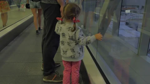 People go on the travolator. Stock Footage 86340623