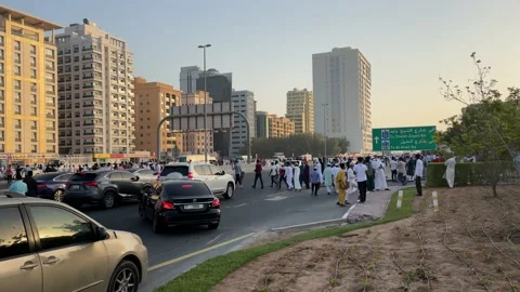 People  going after prayer in al salami masjid Dubai Stock Footage 154162377